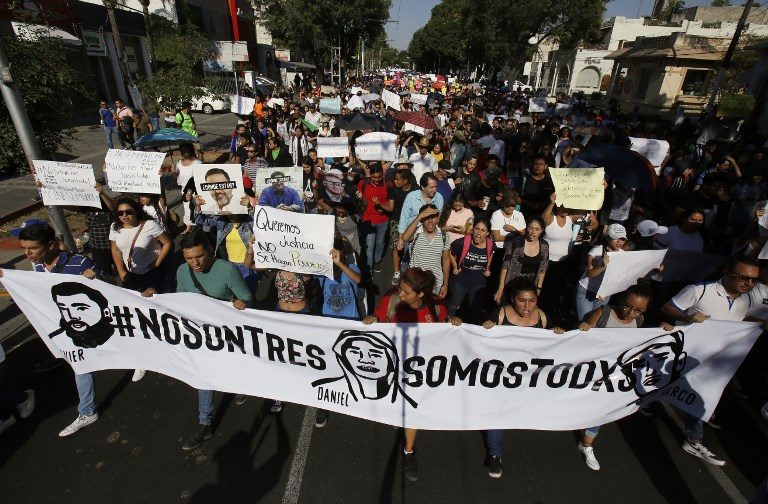 Thousands demand justice for Mexican students dissolved in acid