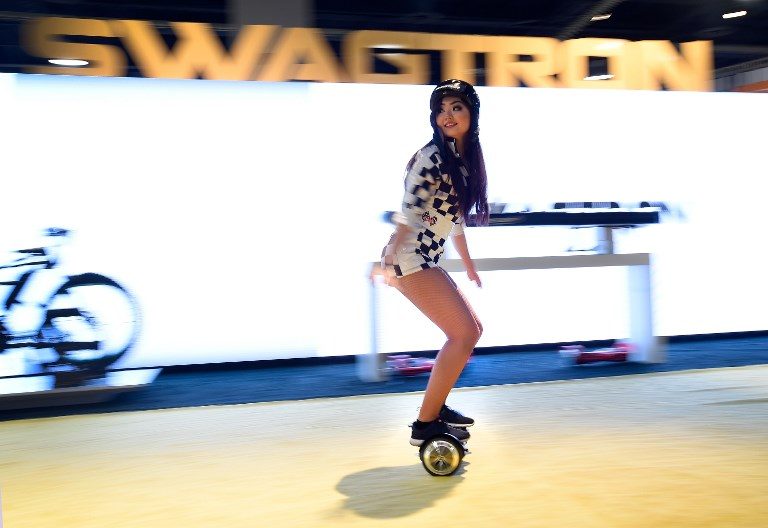 PERSONAL MOBILITY. A model rides a Swagtron T3 hoverboard at CES 2017 at the Las Vegas Convention Center on January 6, 2017 in Las Vegas, Nevada. Photo by David Becker/AFP 