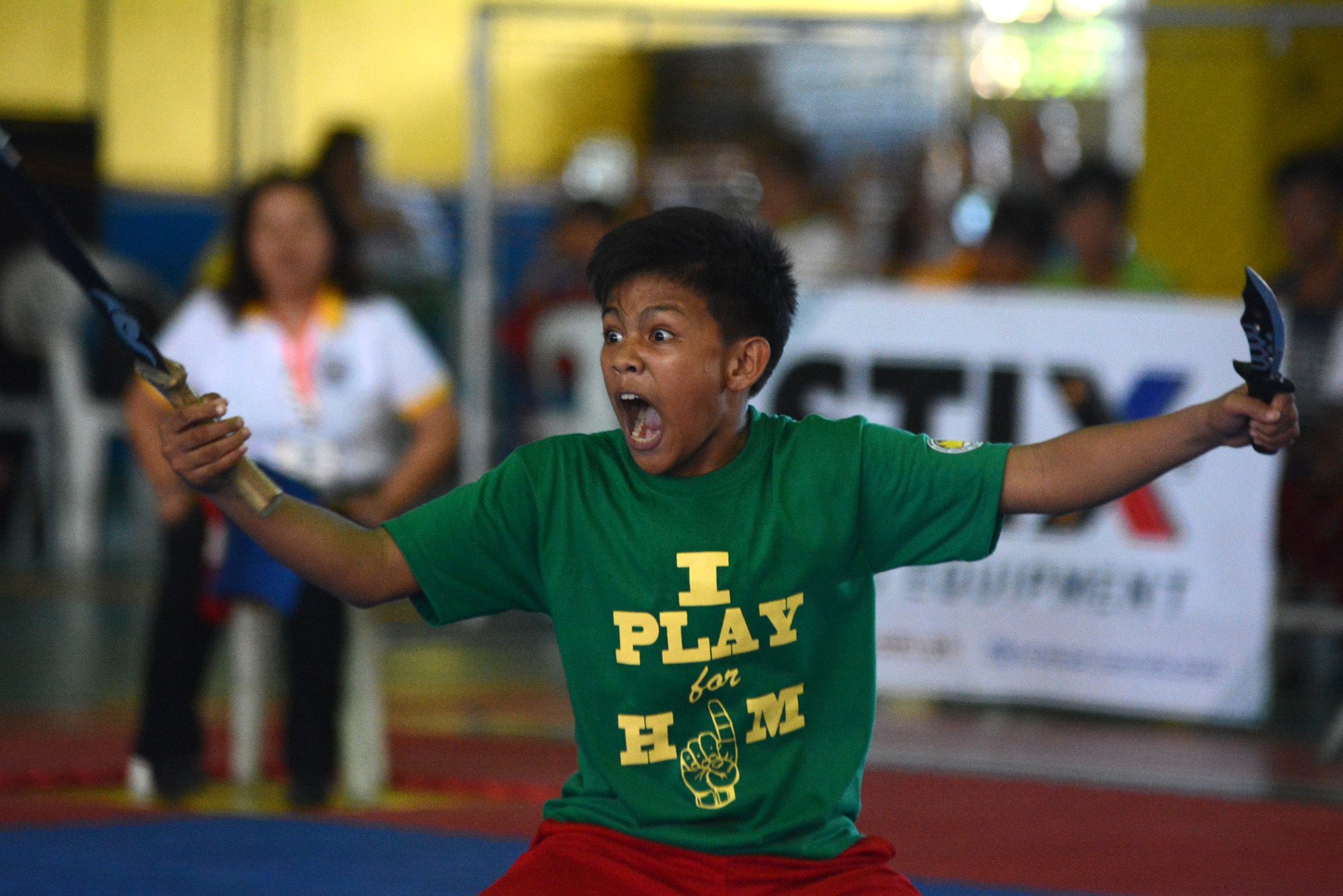 ROAR. An arnis player from CAR in competition. Photo by Roy Secretario/Rappler  