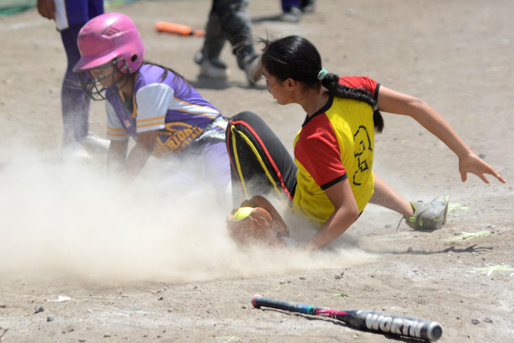 SAFE OR OUT? In this elementary softball match, Soccsksargen wins over Caraga. Photo by Roy Secretario/Rappler  