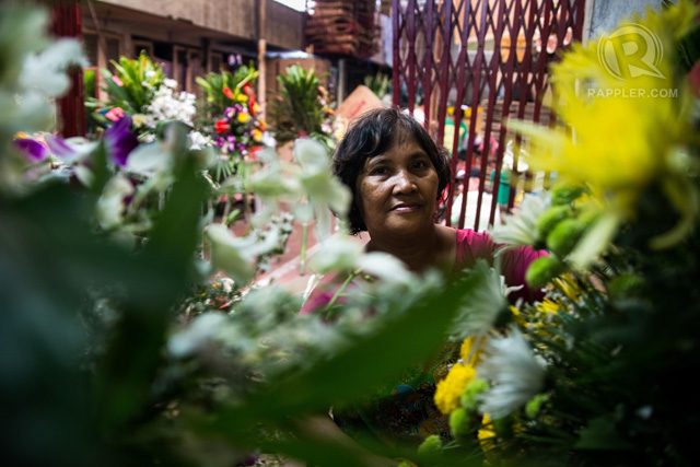 FLOWER ARRANGER. The resilient Osang inside Bernardo's flower shop.