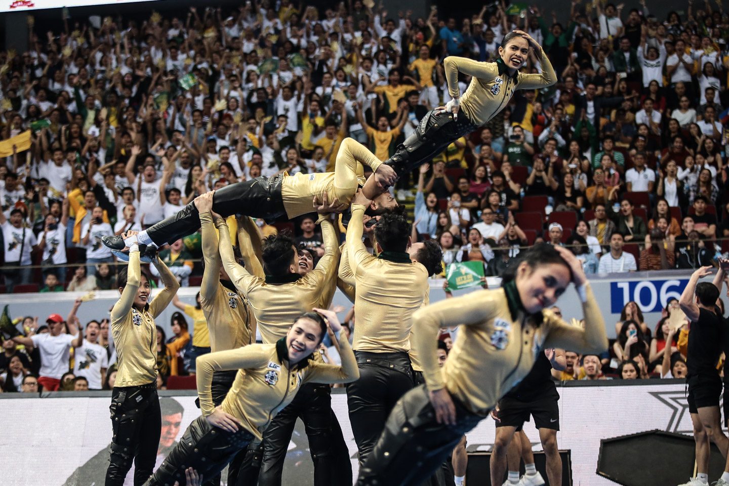 TRIBUTE. The FEU Cheering Squad brings its Michael Jackson-inspired routine to another level to captivate the audience. Photo by Josh Albelda/Rappler   