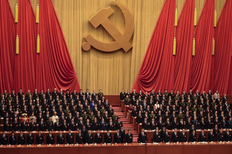 CHINA CONGRESS. Delegates listen to the Internationale at the end of the closing session of the 19th Communist Party Congress at the Great Hall of the People in Beijing on October 24, 2017. President Xi Jinping's name was added to the Party's constitution during the congress, elevating him alongside Chairman Mao to the pantheon of the country's founders. Photo by Whang Zhao/AFP  