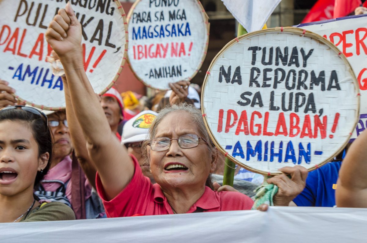 JOBS, LAND, JUSTICE AND PEACE. Women farmers belong to the group AMIHAN were also present in the Mendiola rally 