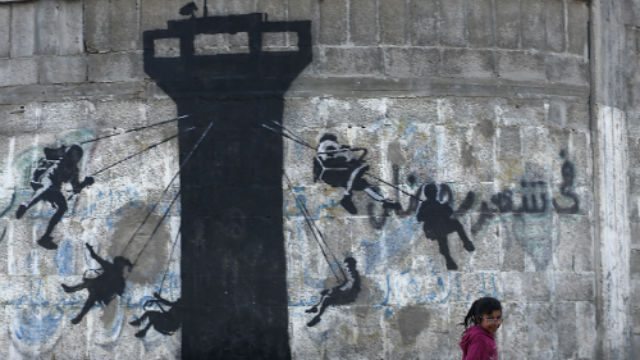 Artist Banksy opens sinister theme park at British seaside