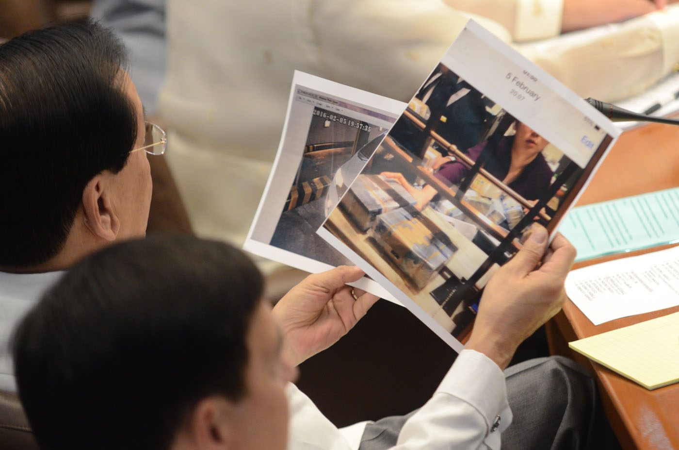 CCTV SCREENSHOTS. Senator Sergio Osmeña III browsing through evidences handed out by Wong. Photo by Alecs Ongcal/Rappler 