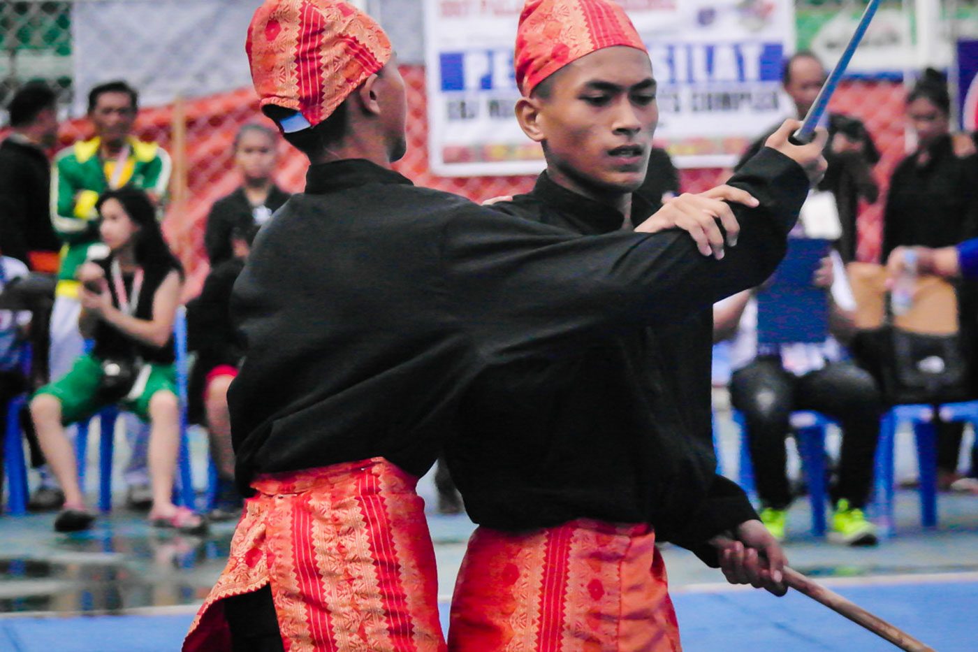 DEADLOCK. A Pencak Silat contender takes a deep breath as he looks for ways to counter his opponent's move during the introduction of the art as one of the demonstration sports for the 2017 Palarong Pambansa.  