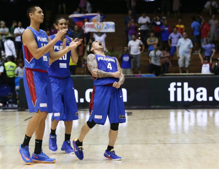 BIG MOMENT. Jimmy Alapag roars and takes in the big moment of the Philippines notching a win in the 2014 FIBA World Cup. Photo from FIBA.com 