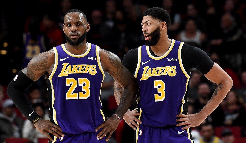 EMOTIONAL. LeBron James and Anthony Davis try to lead the Lakers in their first game since Kobe Bryant's shock death. Photo by Steve Dykes/Getty Images/AFP  