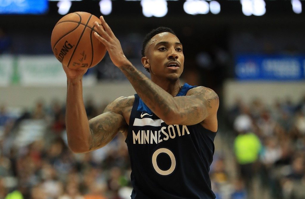 Lowly Hawks land guards Teague, Graham from Timberwolves