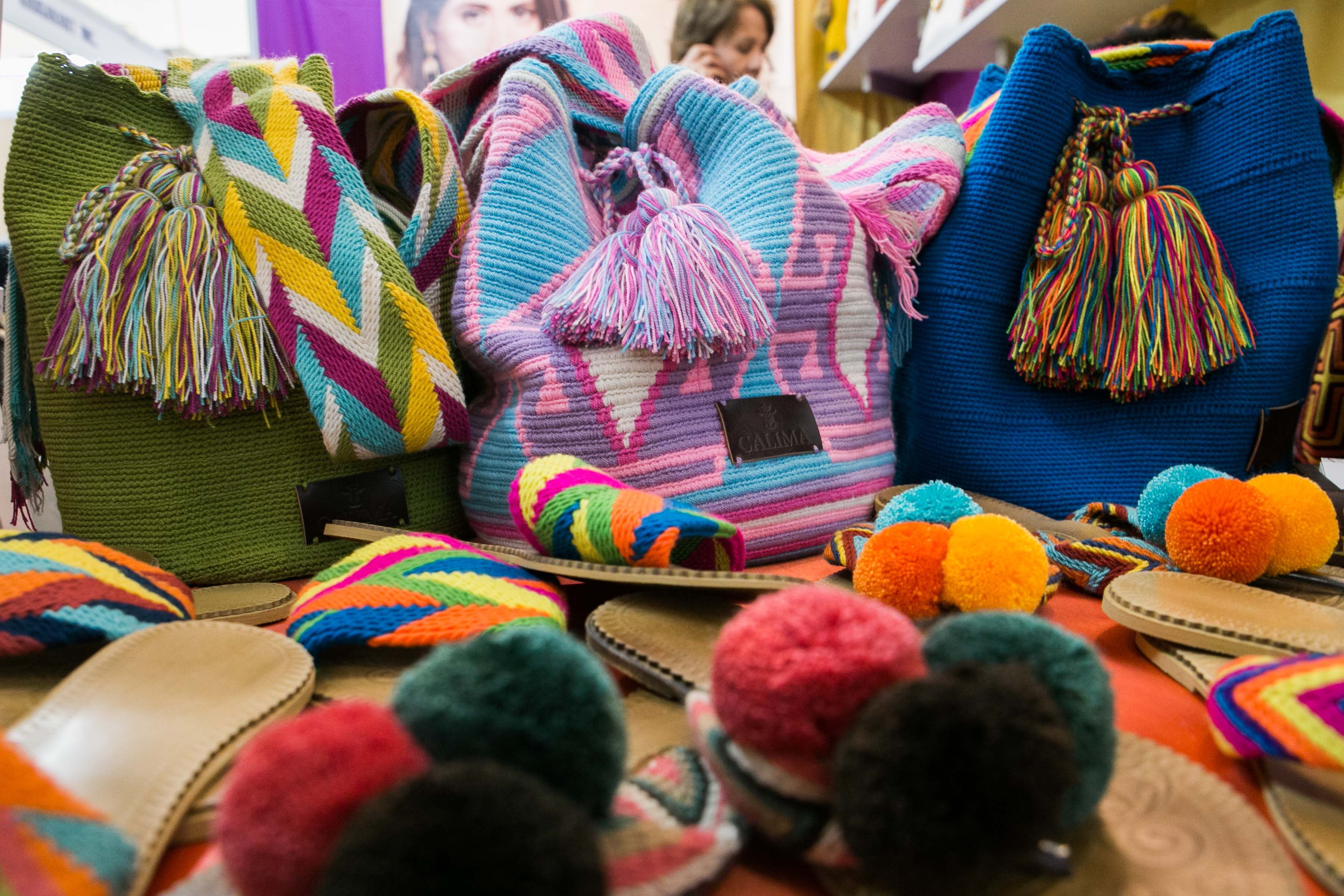 MOCHILA. These bags and sandals were handmade by the Wayuu tribe in Colombia. Parts of Calima's profits go to the community there. According to Hernandez, most of the women there earn money through woven products. Photo by Pat Nabong/Rappler
