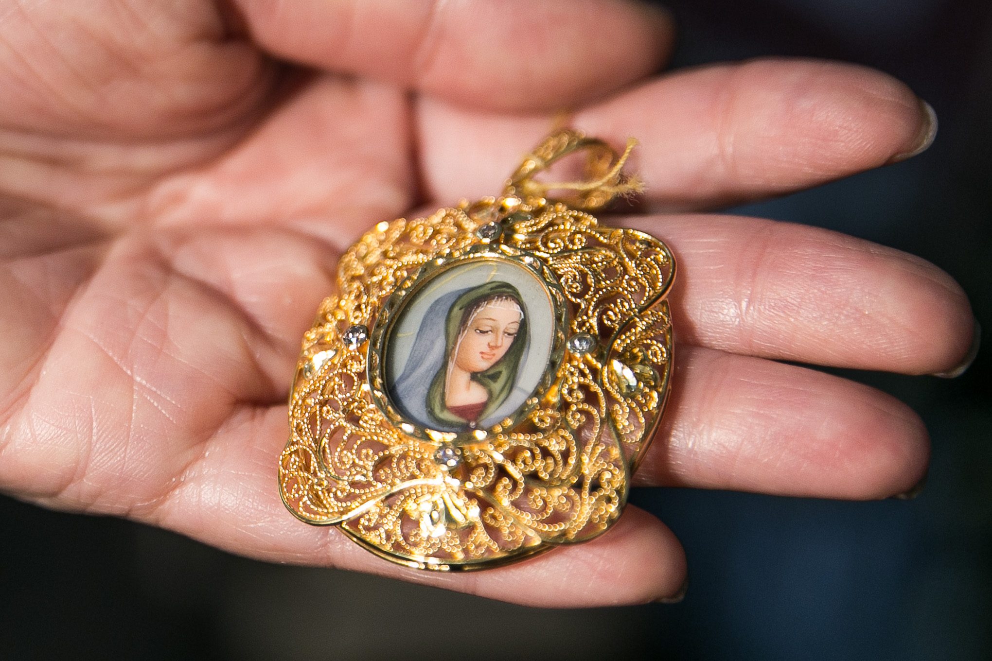 PENDANT. A miniature painting was turned into a pendant and encased in gold. Photo by Pat Nabong/Rappler