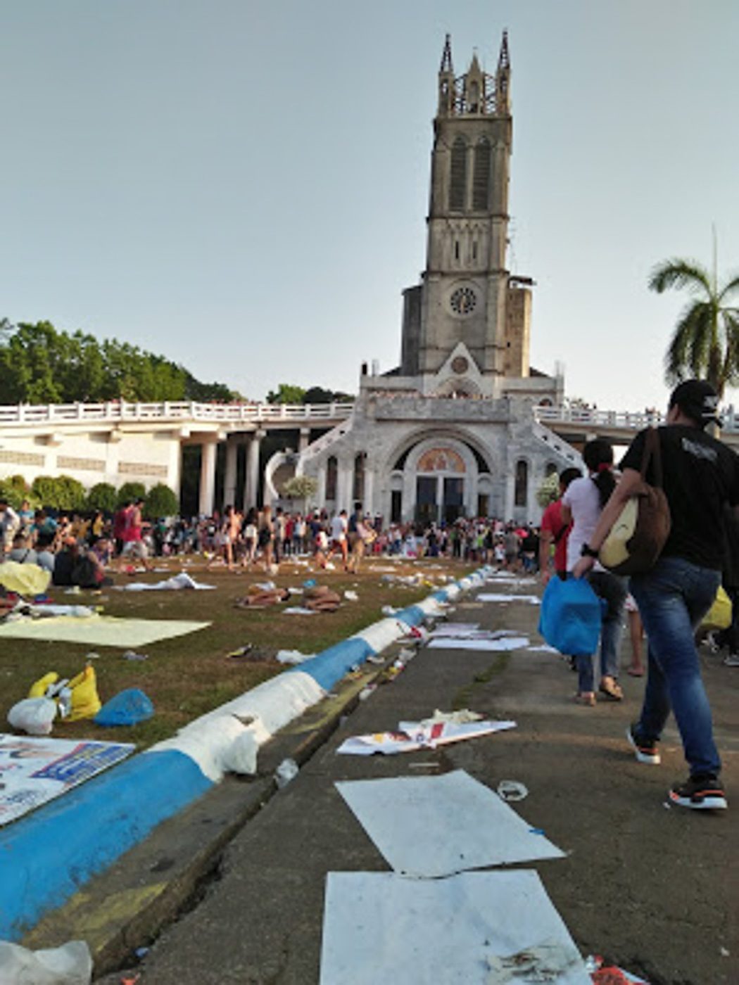 Front of Our Lady of Lourdes Grotto Shrine with scattered campaign materials. Photo courtesy of EcoWaste Coalition blog 