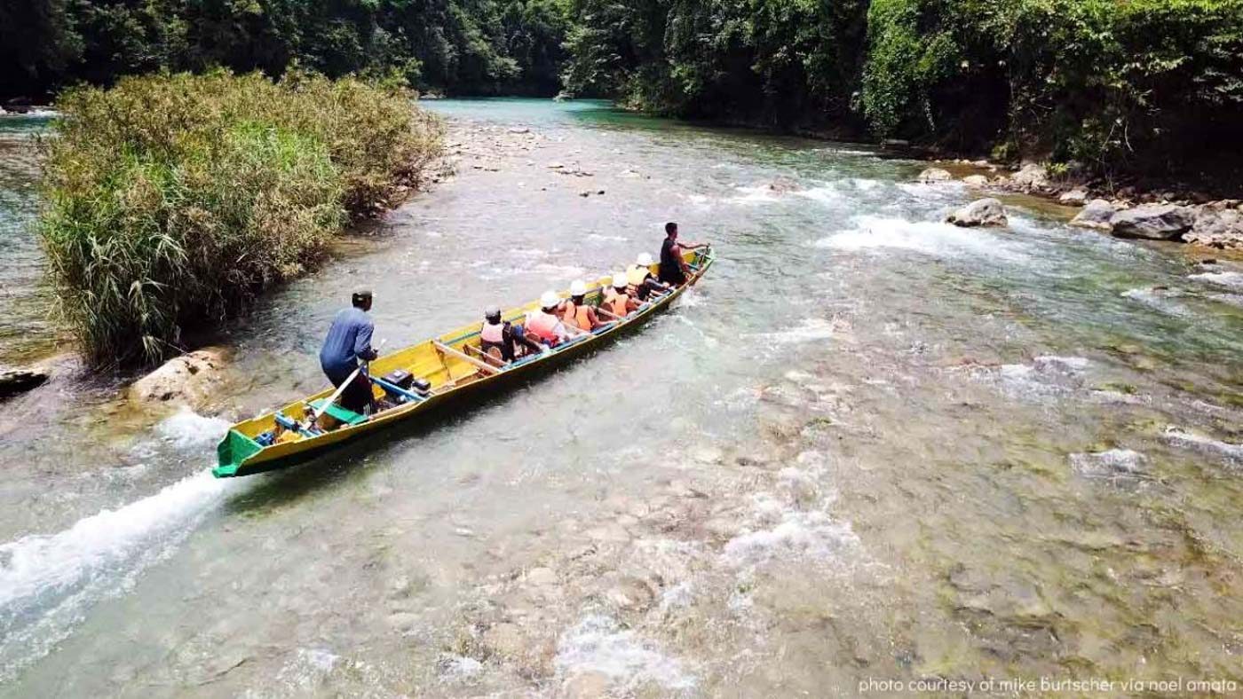 ULOT RIVER. Riding a baroto through a quiet part of the river. Photo by Potpot Pinili 