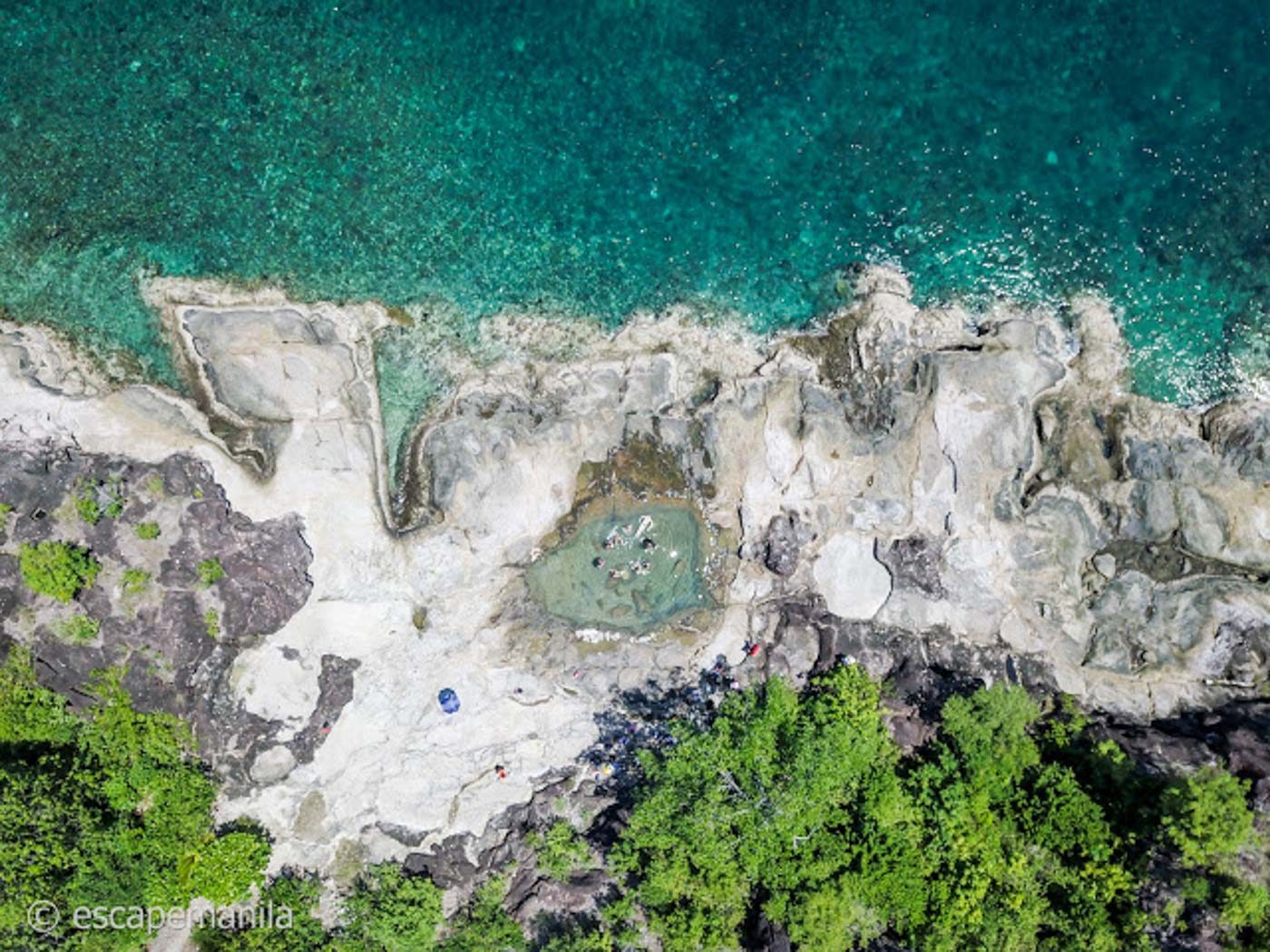 ROCK POOL. A crater in these rocks at Bisaya-Bisaya Island make a natural pool perfect for swimming. Photo by Glen Santillan 