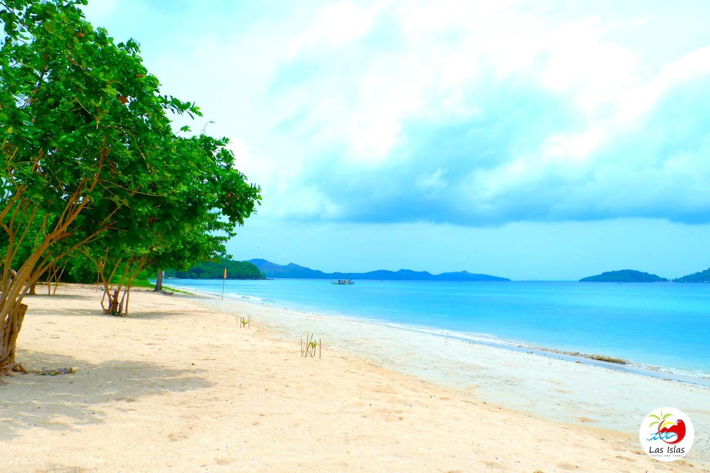 WHITE BEACH. Just one of Sicogon's fine stretches of sand. Photo courtesy of Las Islas Travel and Tours 