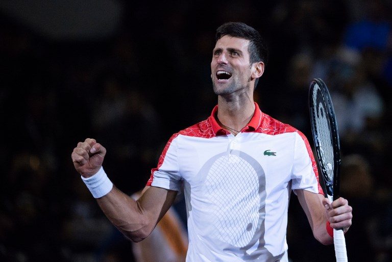 Djokovic crushes Isner in ATP Finals opener