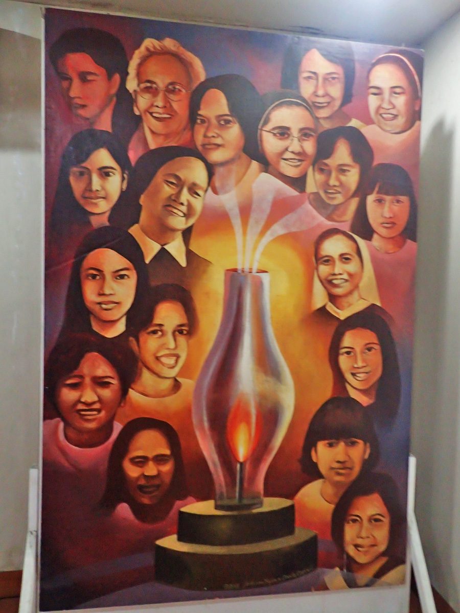 WOMEN FIGHTING. Around the Hall of Remembrance are paintings depicting heroes and life under Marcos' rule. This is a painting of women heroes Liliosa Hilao, Purificacion Pedro, Soledad Salvador, and more.  