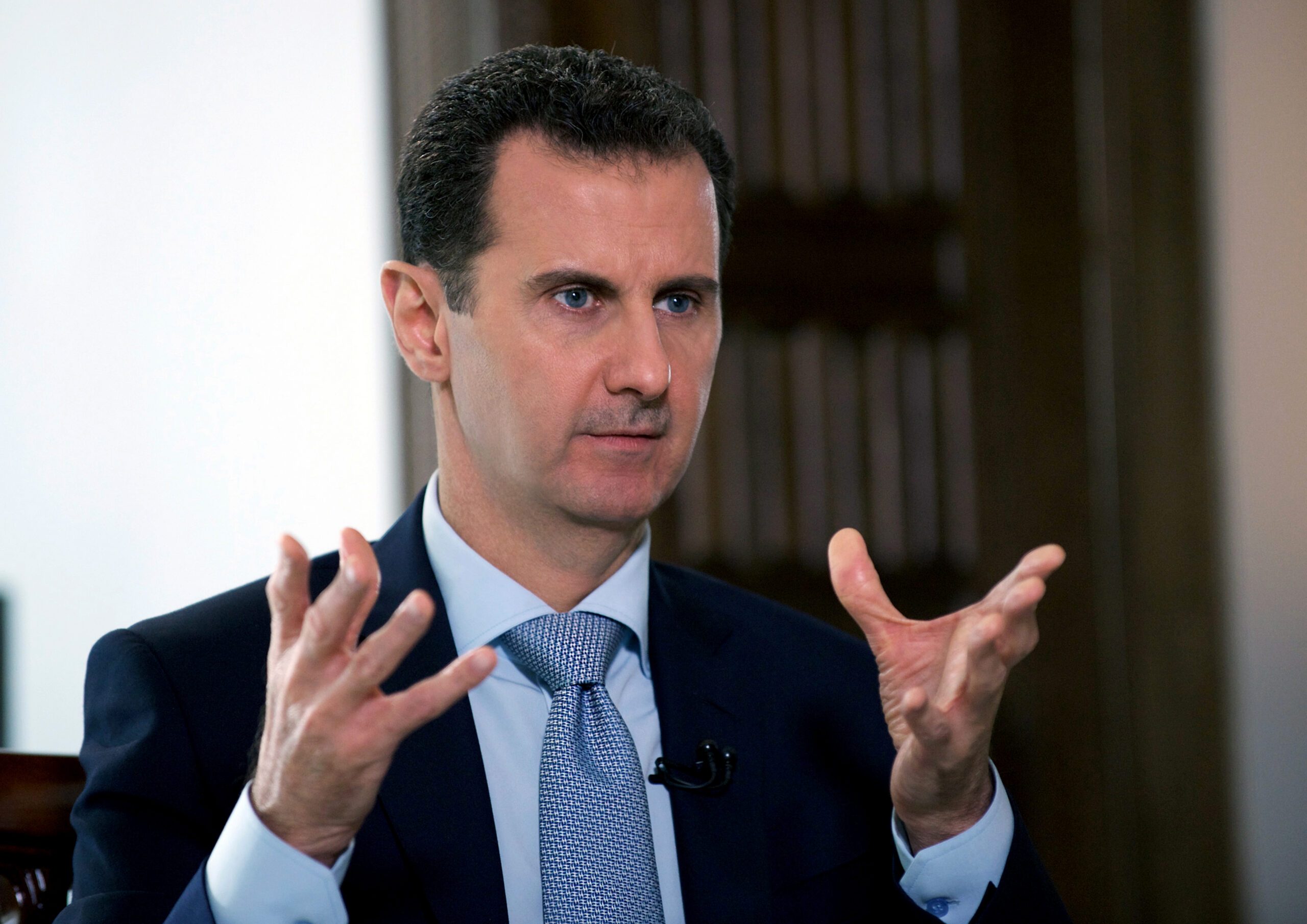 Syria’s Assad says willing to hold early presidential vote