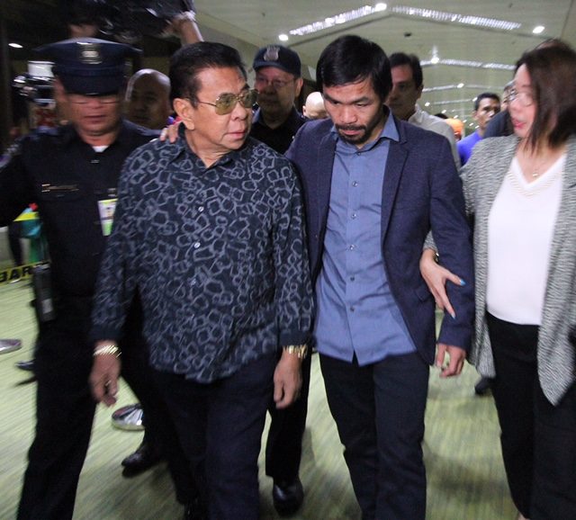ARRIVAL. Manny Pacquiao arrives at NAIA Terminal 1 together with former Ilocos Sur governor Chavit Singson. Photo by Jedwin M Llobrera/Rappler  