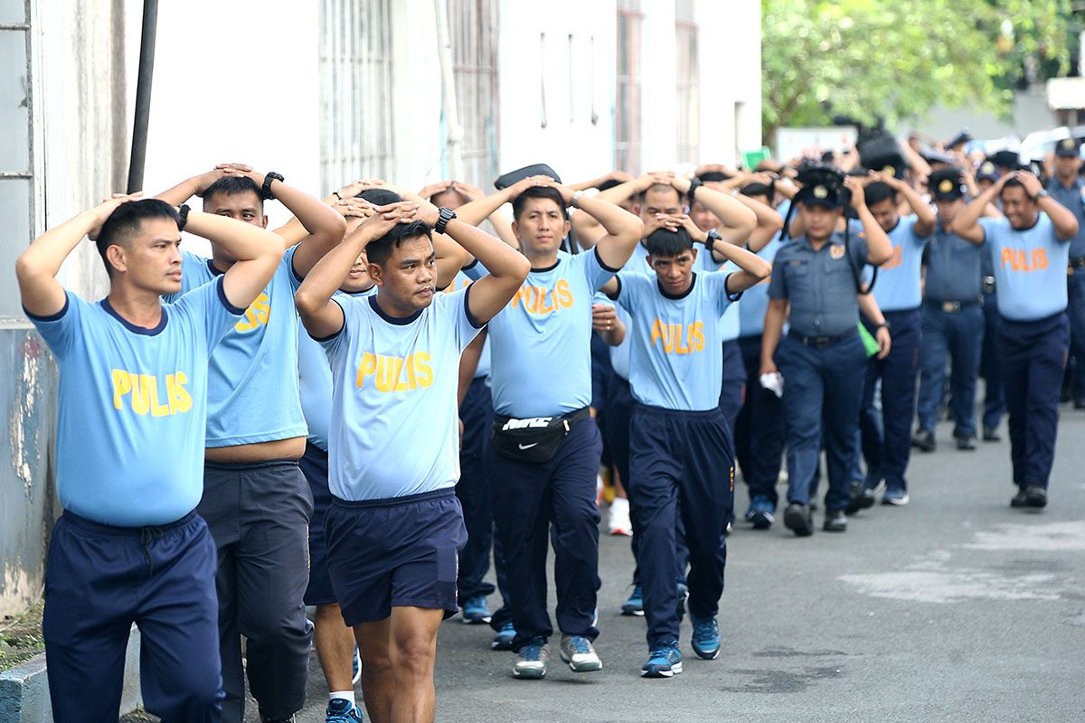 Police and non-uniformed personnel of the Manila Police District participate in the 2nd Quarter Nationwide Simultaneous Earthquake Drill (NSED) in Manila on June 21, 2018. Photo by Ben Nabong/Rappler 