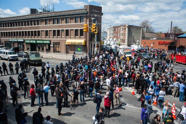 Baltimore braced for new night of protest as Obama warns police