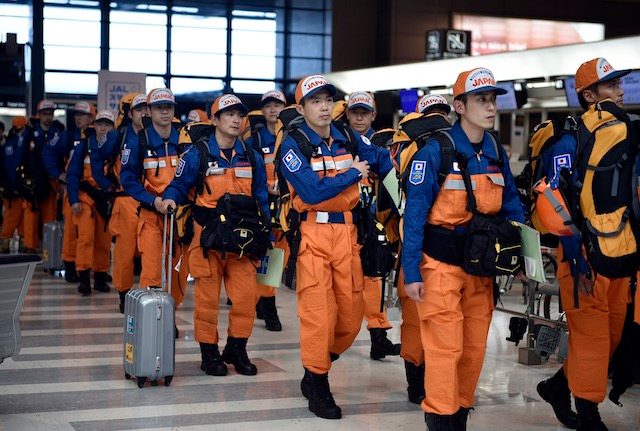 TO NEPAL. Members of a Japanese rescue team heading to Nepal walk through the airport lobby on their way to board their plane at the Narita International Airport in Narita, east of Tokyo, Japan, April 26, 2015. Franck Robichon/EPA 