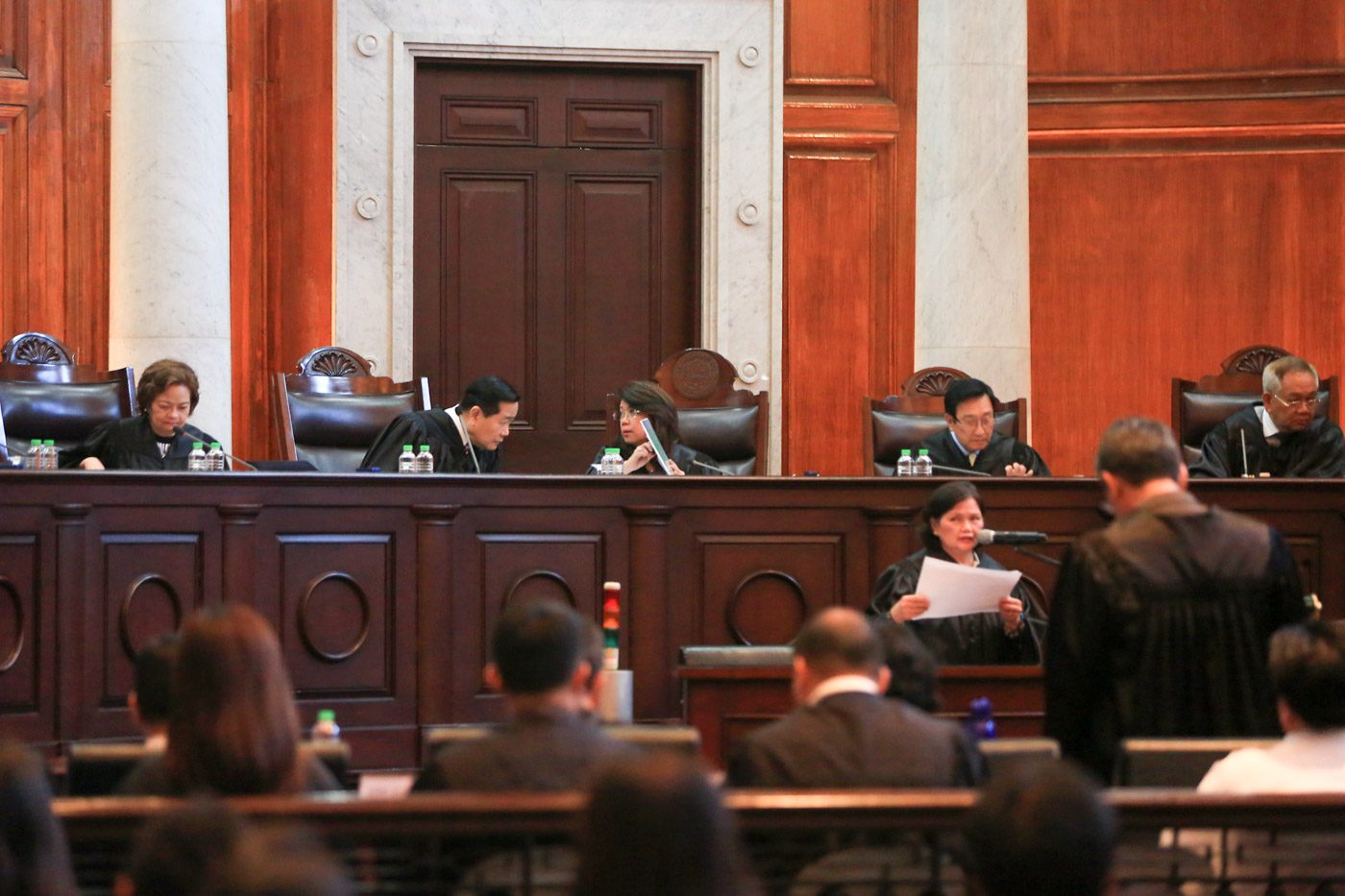 'FIRST AMONG EQUALS.' Chief Justice Maria Lourdes Sereno sits beside her colleagues in the High Court. File photo by Ben Nabong/Rappler  