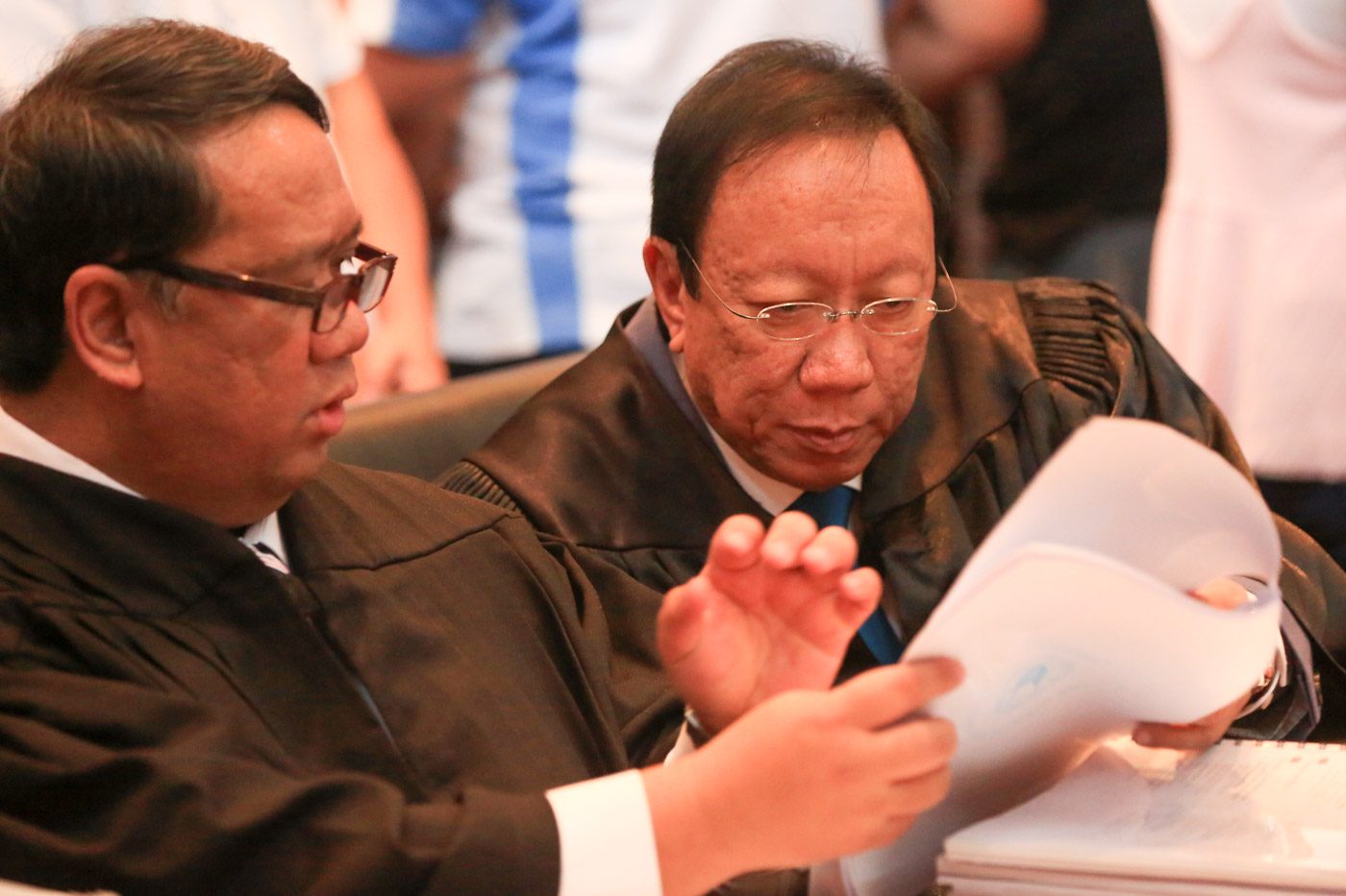 GOVERNMENT CASE. Solicitor General Jose Calida checks documents before presenting his case for the Philippine National Police and other government agents. Photo by Ben Nabong/Rappler  