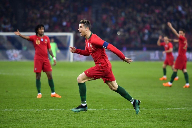 Ronaldo’s last-gasp two-goal show steals Salah limelight