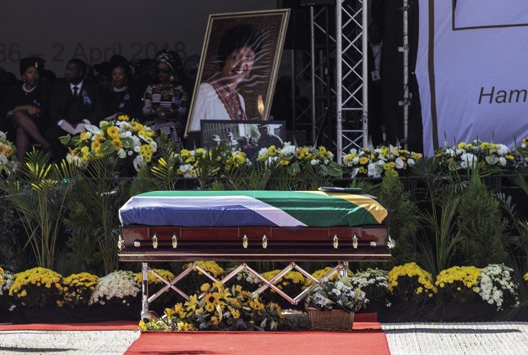 'MOTHER OF THE NATION'. The coffin of Winnie Madikizela-Mandela is displayed in front of the stage at Orlando Stadium for the funeral ceremony in Soweto, South Africa on April 14, 2018. Photo by Gianluigi Guercia/AFP  