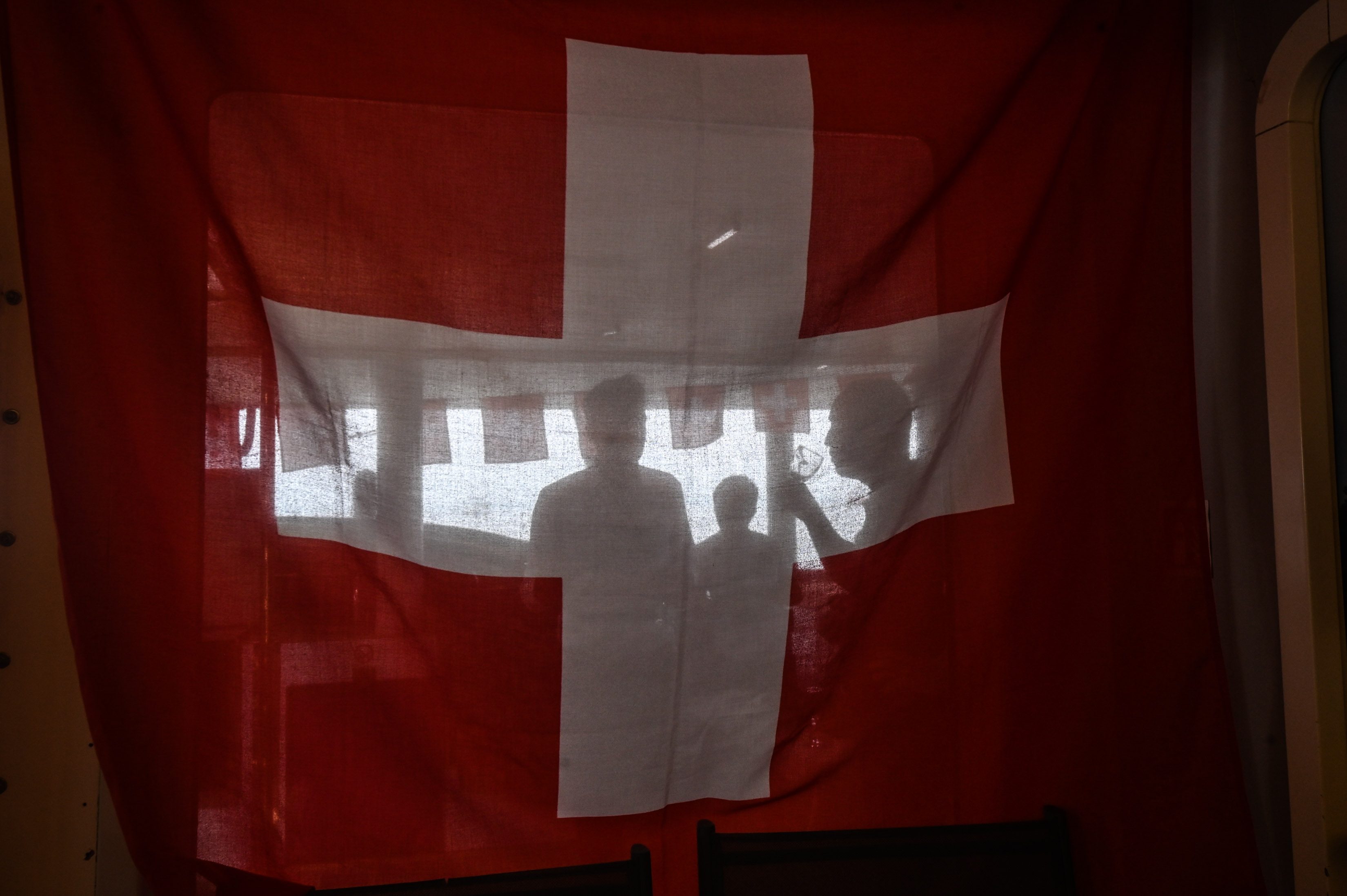 SWISS FLAG. Swiss flag hangs in the main lobby of the ship. Photo by Alecs Ongcal/Rappler   