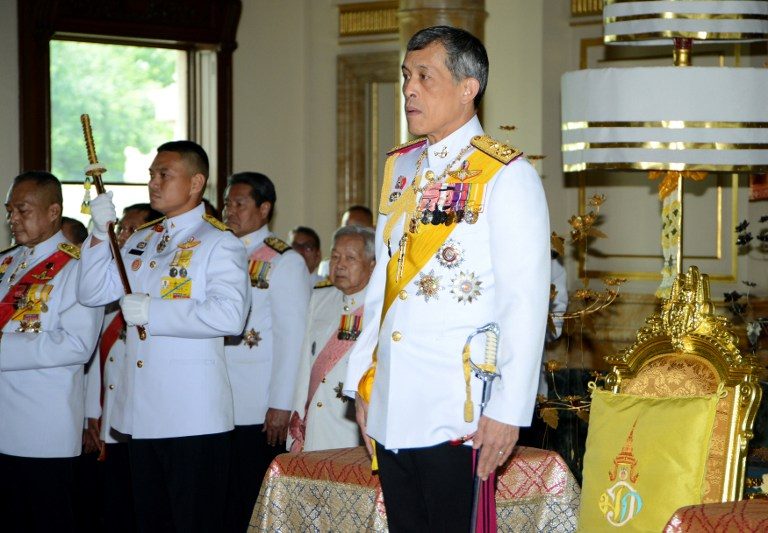 Thai king signs junta’s new constitution