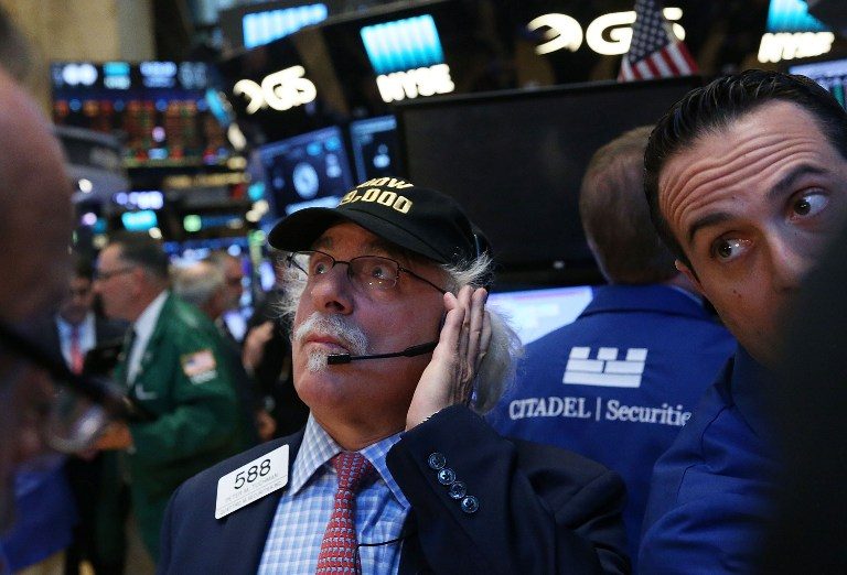 Dow breaks record as global equities rise