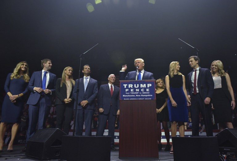 Republican presidential nominee Donald Trump speaks during a rally at the SNHU Arena in Manchester, New Hampshire on November 7, 2016. From left: daughter-in-law Lara Yunaska, son Eric Trump, daughter in law Vanessa Trump, Donald Trump, Ivanka Trump, son-in-law Jared Kushner, and Tiffany Trump. Mandel Ngan/AFP 
