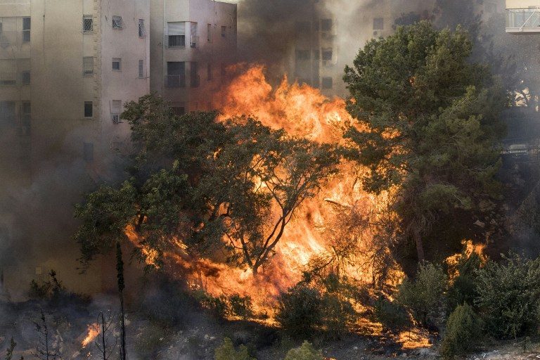 Israeli settlers flee as West Bank wildfires spread