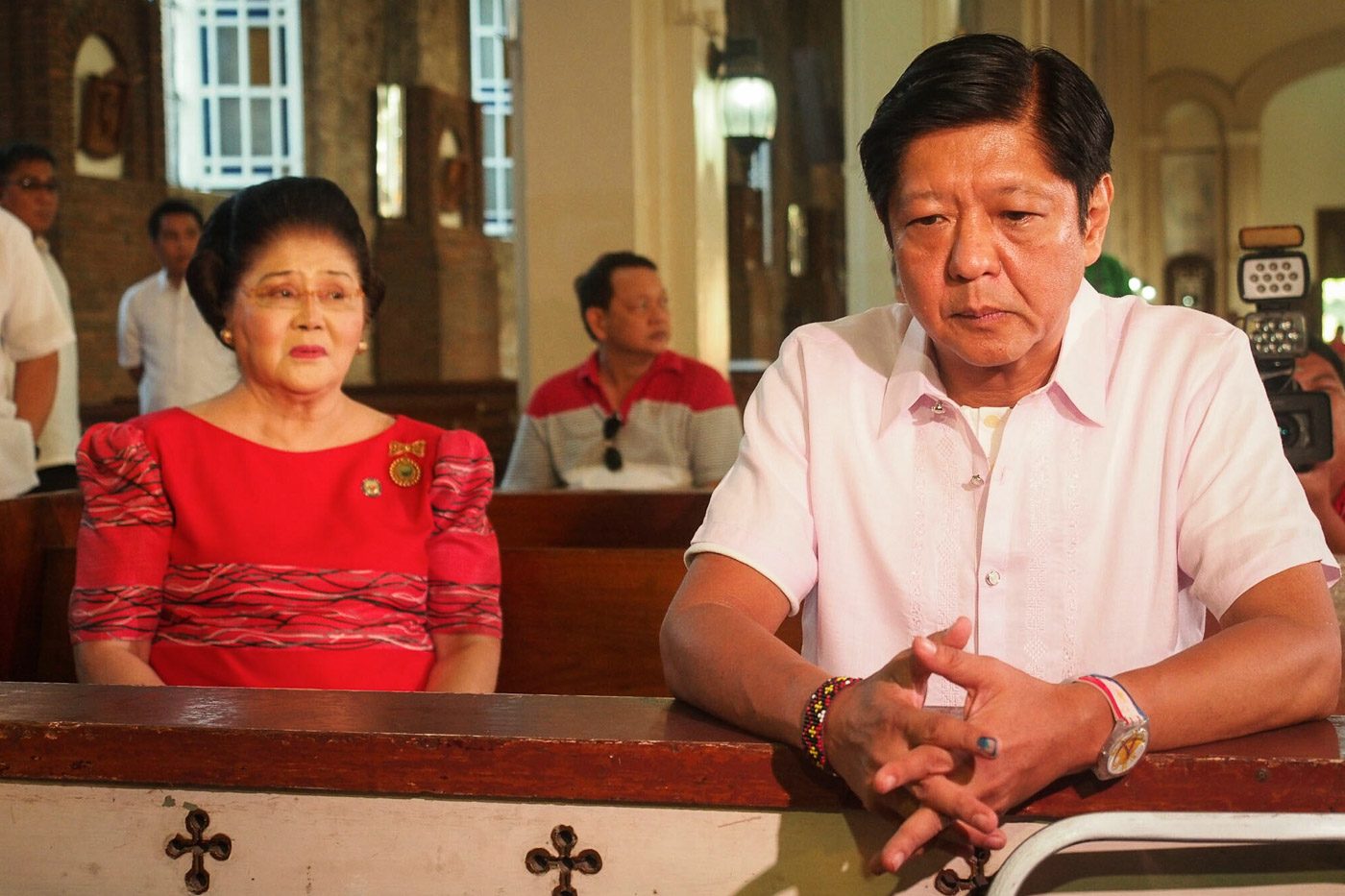 Vice Presidential candidate Senator Bongbong Marcos is joined by his mother Imelda in praying before casting his vote in Batac, Ilocos Norte. Photo by Jasmin Dulay/Rappler   