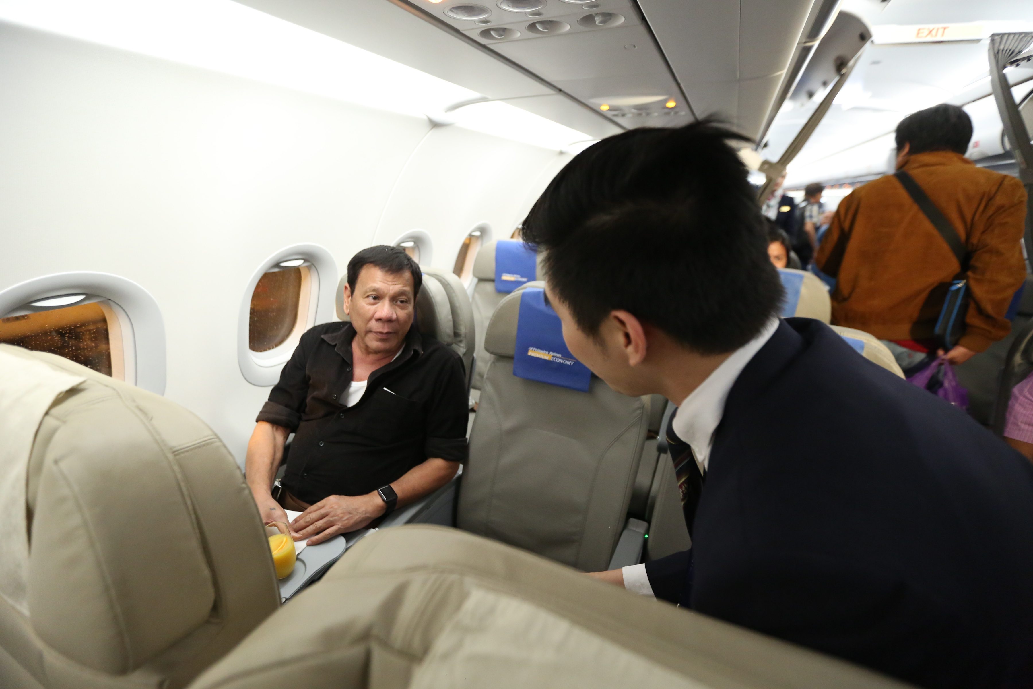 HOME FOR THE WEEKEND. Duterte tucks in for his late-night flight back to Davao City on July 7, 2016. Photo by King Rodriguez/Malacañang PPD  