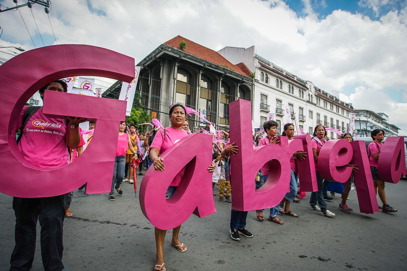 SUPPORT. Gabriela Partylist representatives march to the Comelec office in Manila to file their Certificates of Candidacy on October 12, 2018. Photo by Jire Carreon/Rappler 