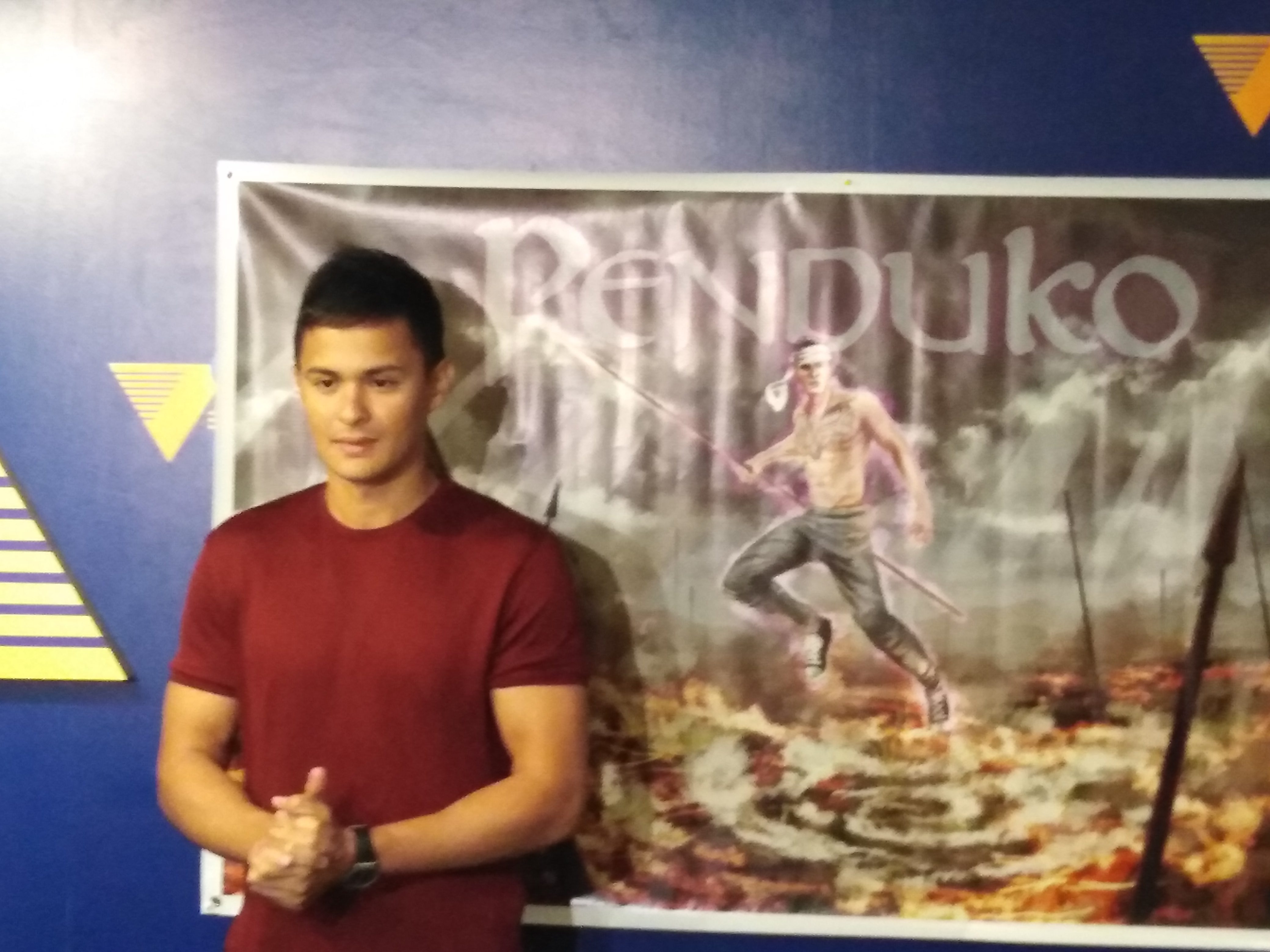 REVAMP. Matteo poses next to the banner of the upcoming movie 'Penduko,' based on the character of Francisco V. Coching. Photo by Alexa Villano/Rappler 