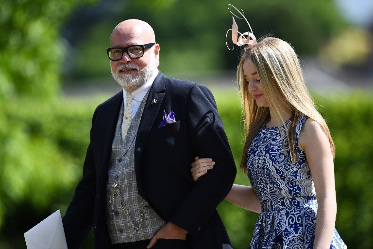 Gary Goldsmith (L), uncle of the bride, attends the wedding of Pippa Middleton and James Matthews at St Mark's Church in Englefield, west of London, on May 20, 2017. Photo by Justin Tallis/AFP Photo 