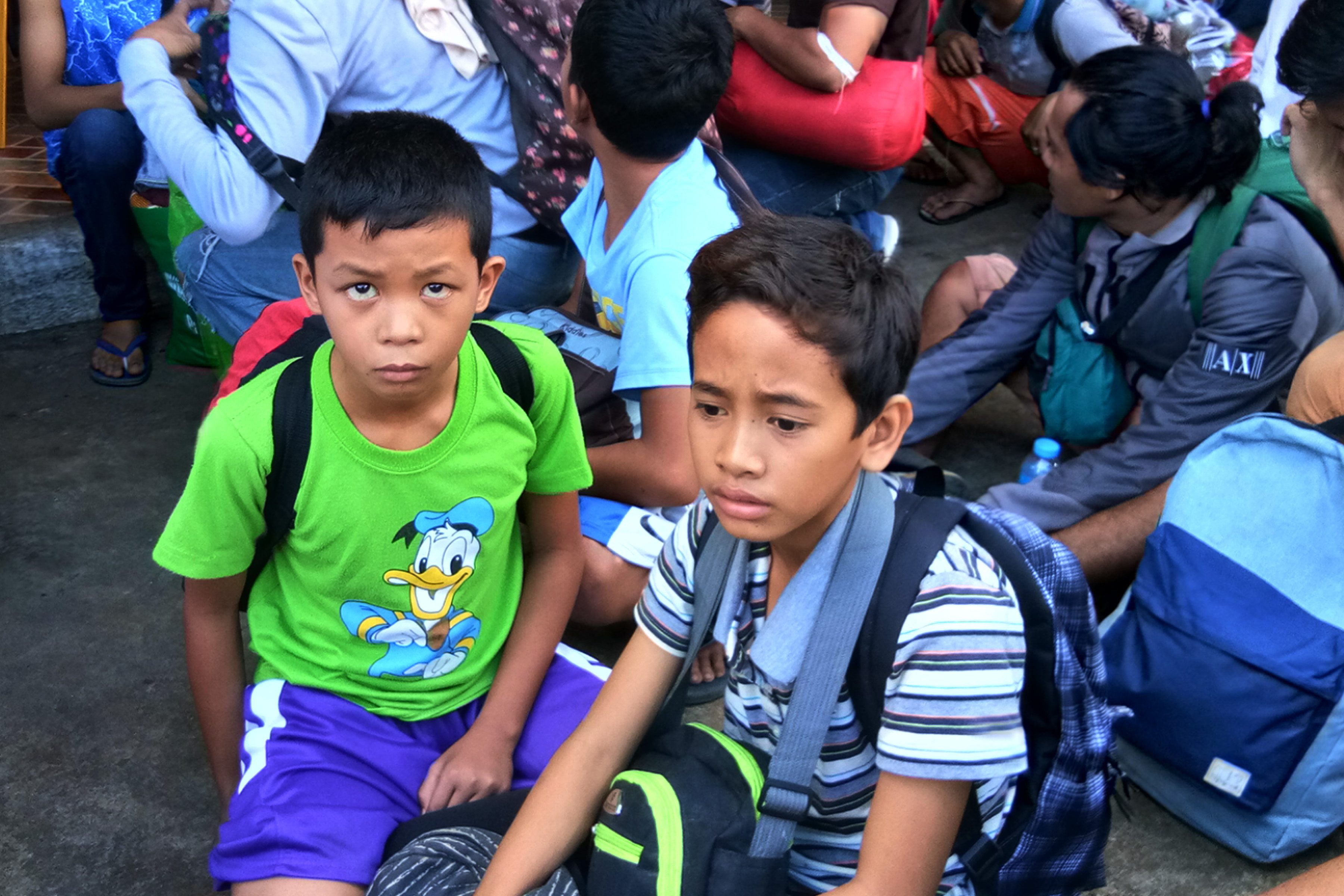 YOUNG SURVIVORS. Gerard Nietes and Jethro Cardon never left each other since the conflict in Marawi started. The two boys were just on vacation to spend their summer vacation in the city. Photo by Bobby Lagsa/Rappler 