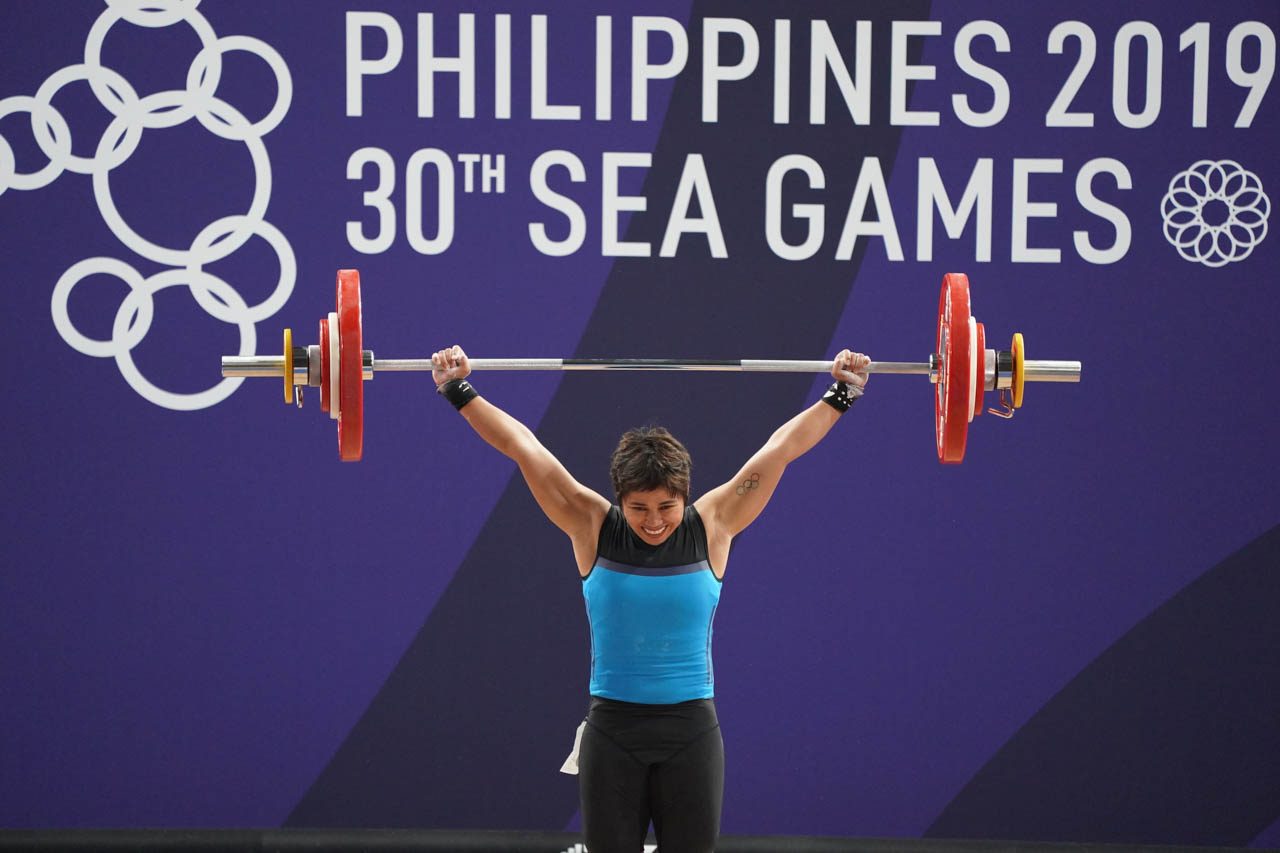 GOLDEN. Hidilyn Diaz adds a SEA Games gold to her collection. Photo by Josh Albelda/Rappler  