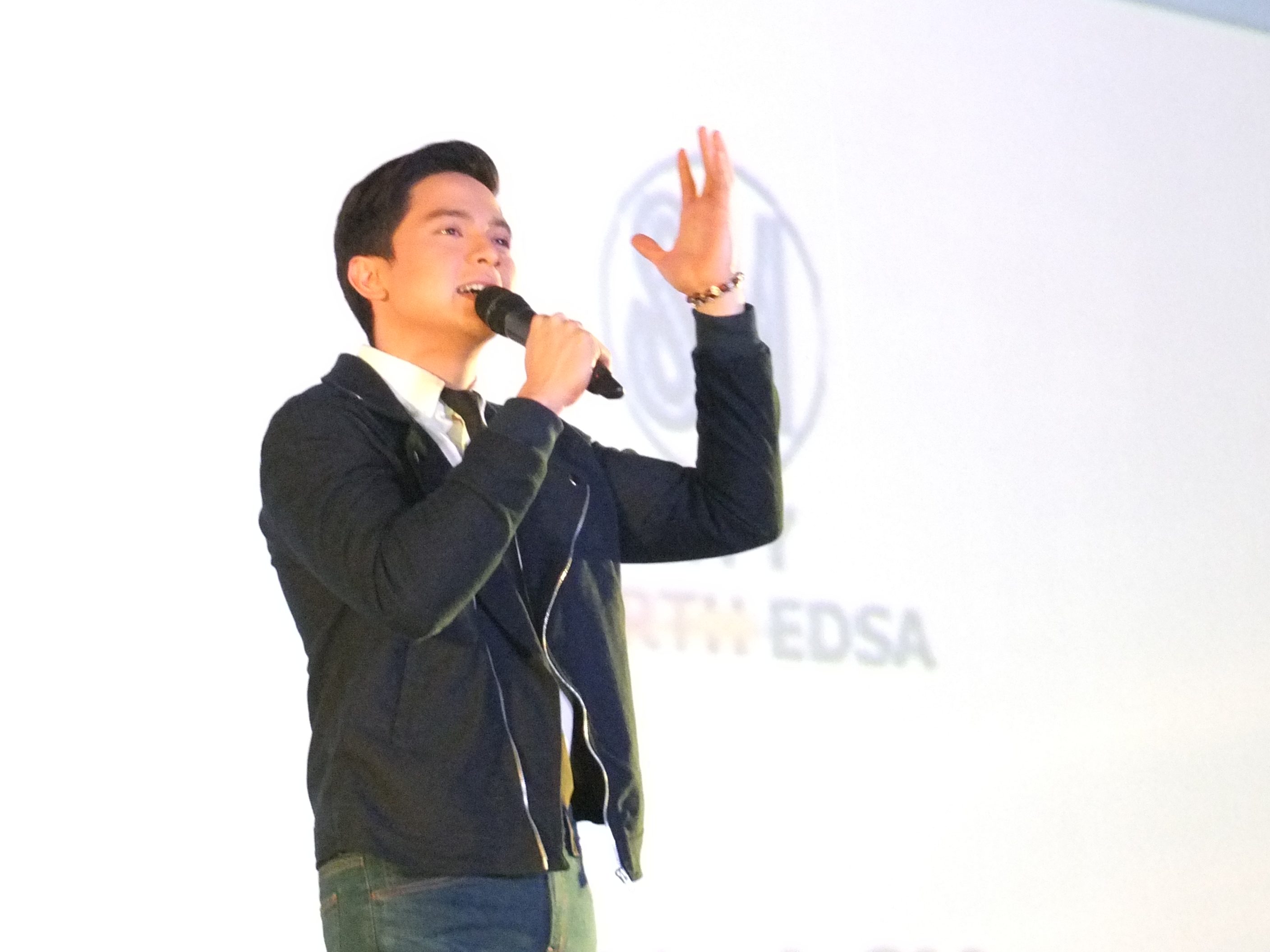 THANK YOU. Alden acknowledges the fans and his family during his album launch in SM North Edsa. Photo by Alexa Villano/Rappler 