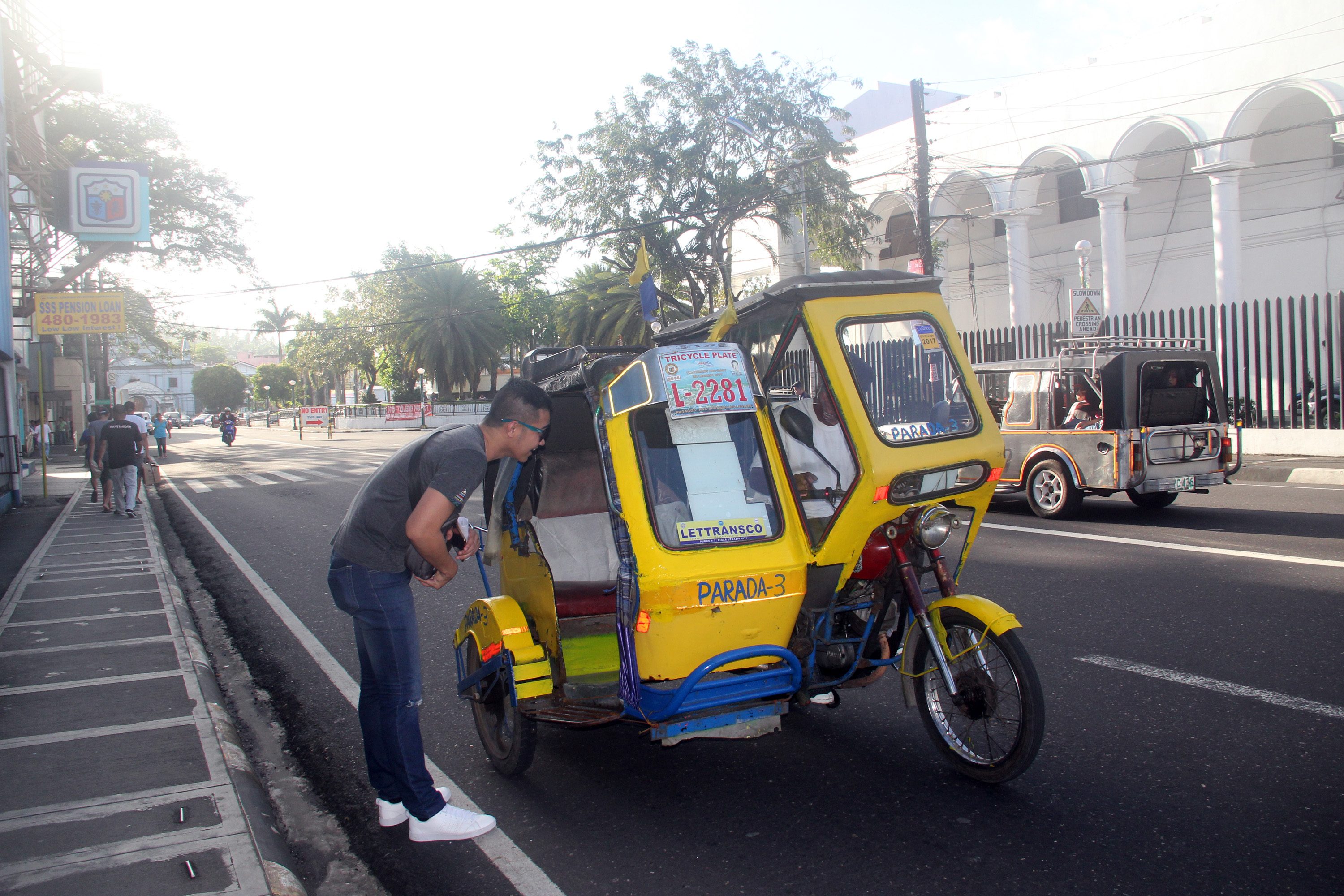ROAMING TRIKES. Tricycles roam around the main thoroughfare in Legazpi City as jeepney drivers launched a regionwide transport strike. Photo by Rhaydz B. Barcia/Rappler 