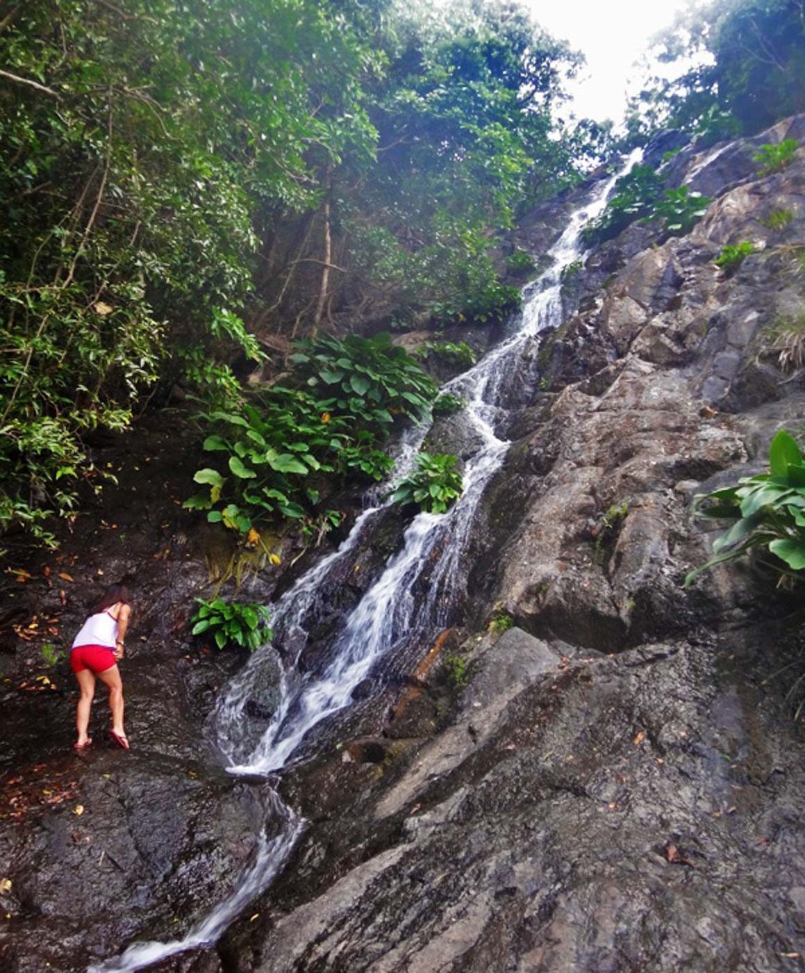 WATERFALLS. There are also waterfalls to trek to in Palaui, like Baratabut Falls here. Photo by Claire Madarang 