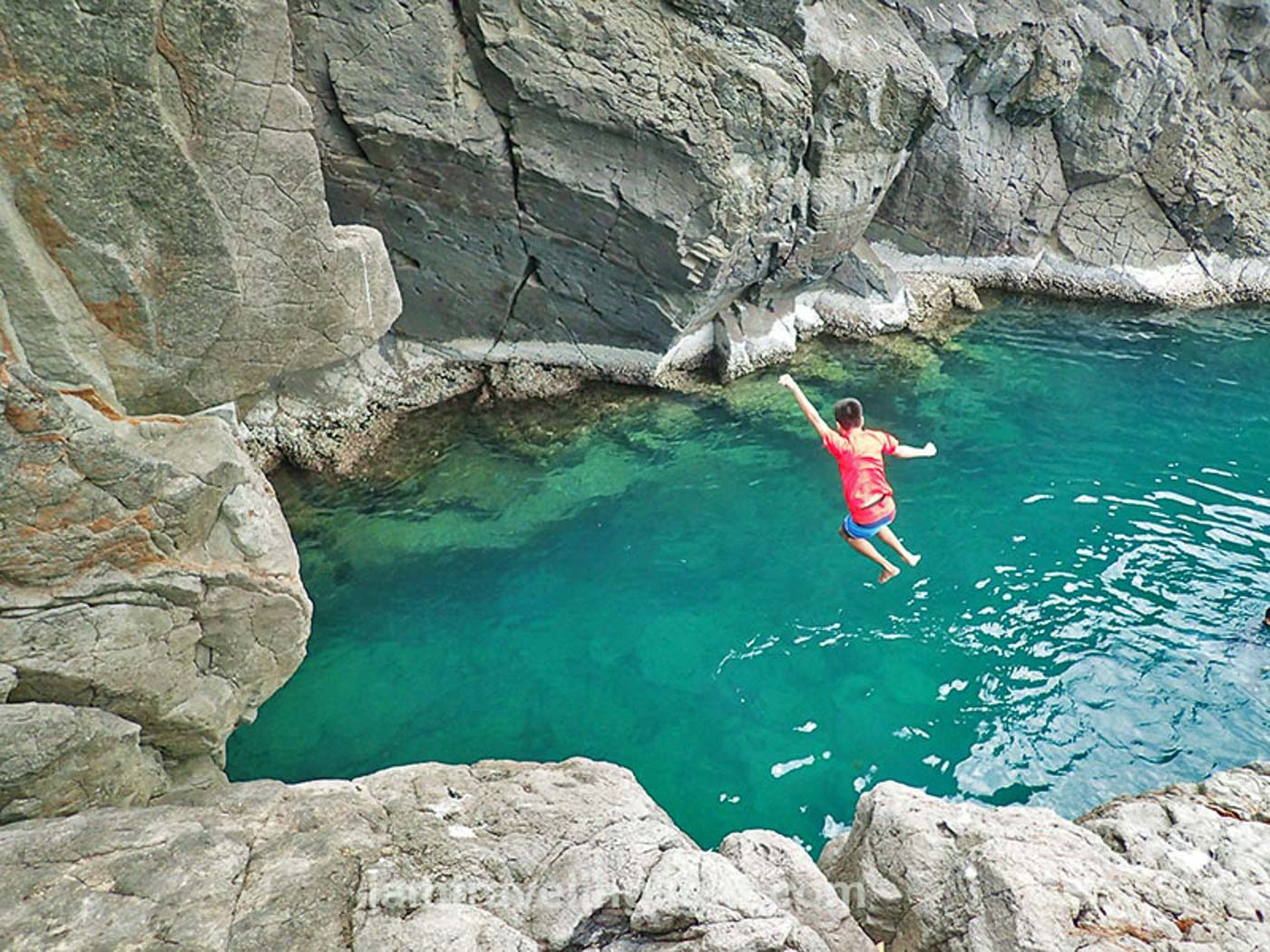 CLIFF JUMP. Jumping into or at least swimming in one of Five Fingers’ lagoons is a must-try. 