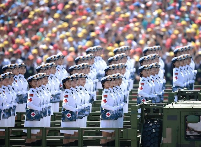 GRAND PARADE. A picture released by Xinhua News Agency shows Chinese female medical corps soldiers marching on Tiananmen Square during a military parade marking the 70th Anniversary of the Victory of Chinese People's Resistance against Japanese Aggression and World Anti-Fascist War in Beijing, China, September 3, 2015. Liu Xiao/EPA 