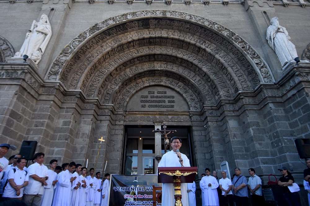 Manila Archbishop Luis Antonio Cardinal Tagle speaks in front of the Manila Cathedral during the 'Walk for Life' procession 