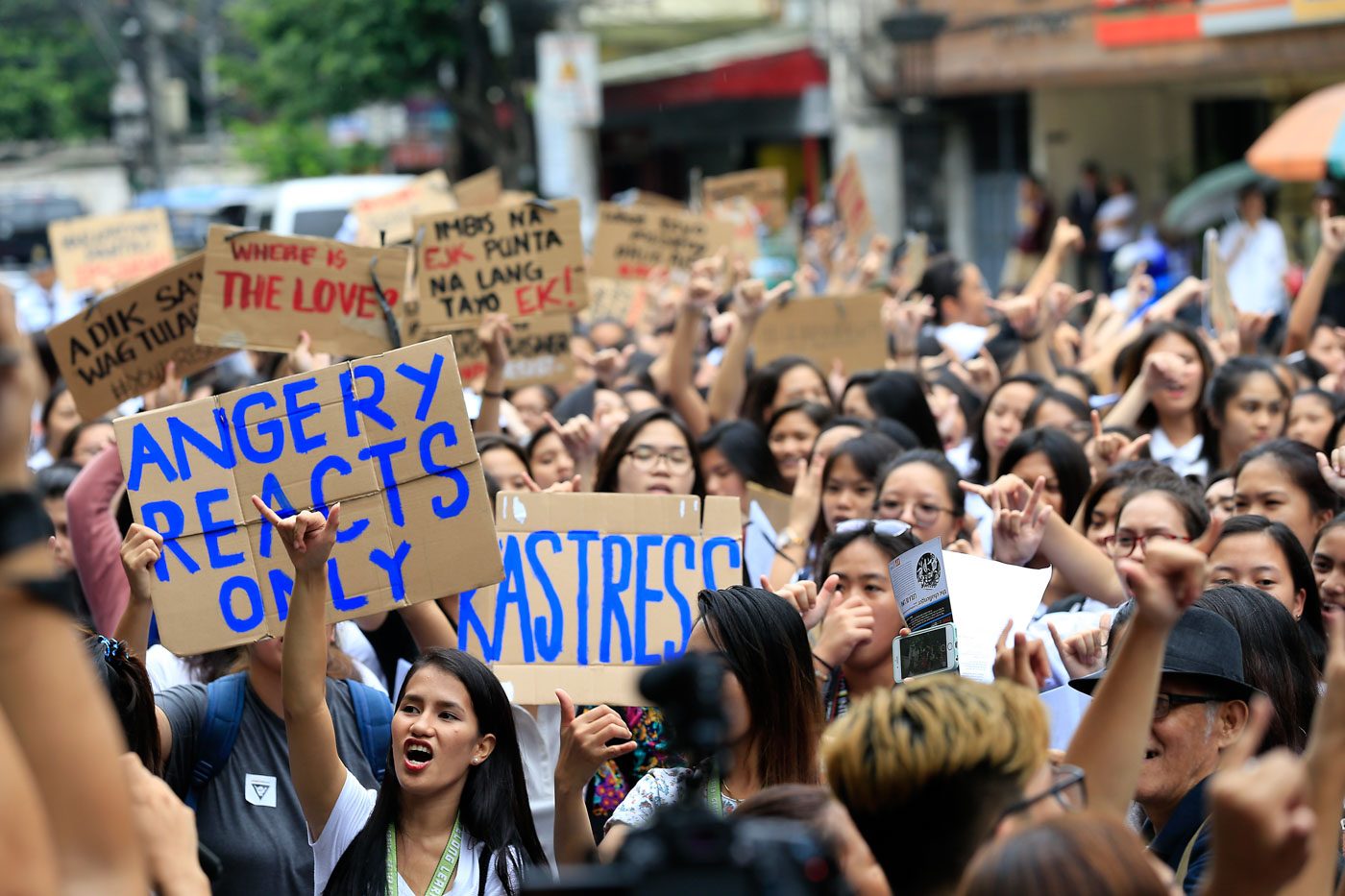 WEEK BEFORE SONA. Students of the St. Scholastica's College along with various activist groups rally outside the college in Manila on July 16, 2017 against the thousands of extra judicial killings involved in the drug war of President Rodrigo Duterte, a week before his 2nd State of the Nation Address. Photo by Ben Nabong/Rappler 